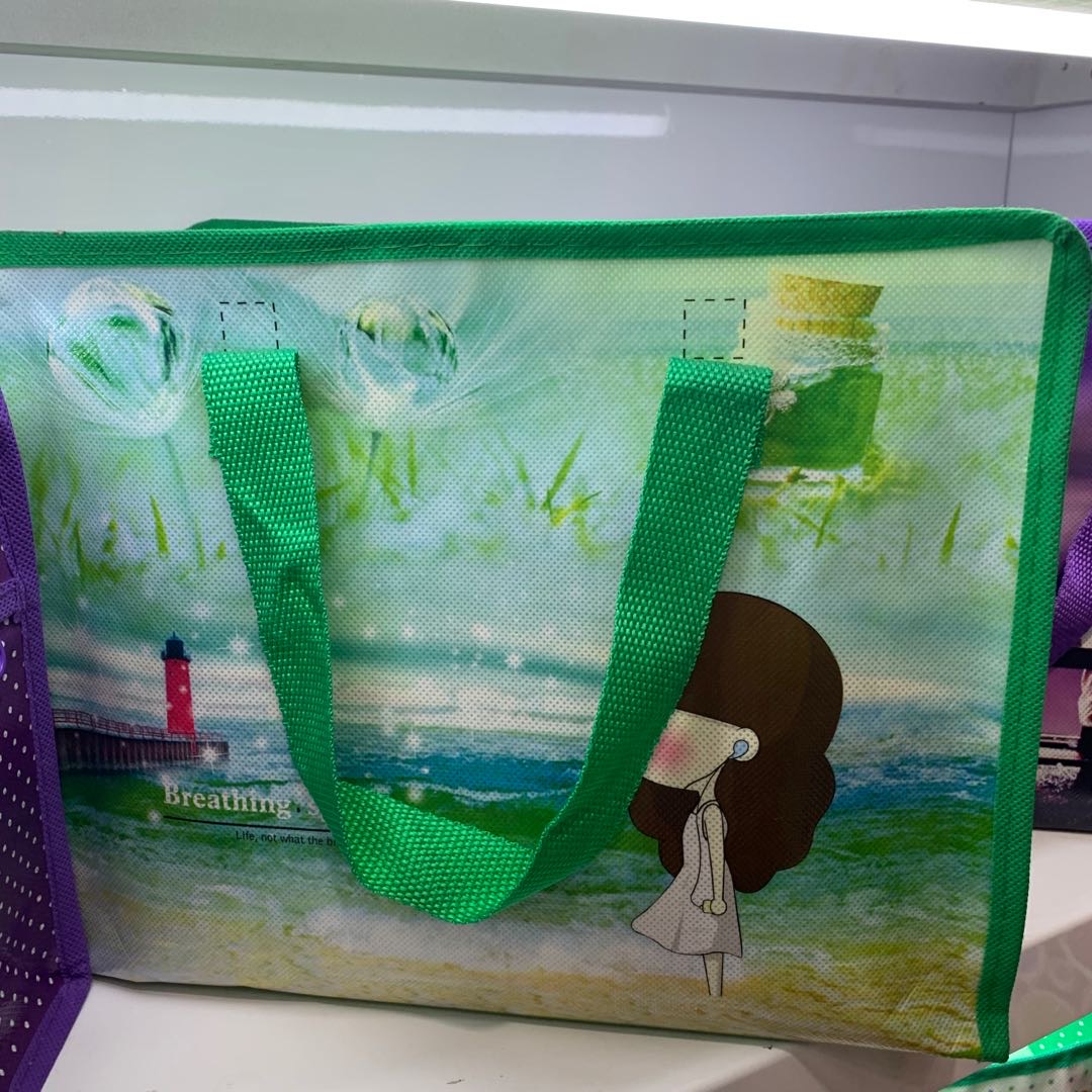 青绿色少女多功能袋子旅行包