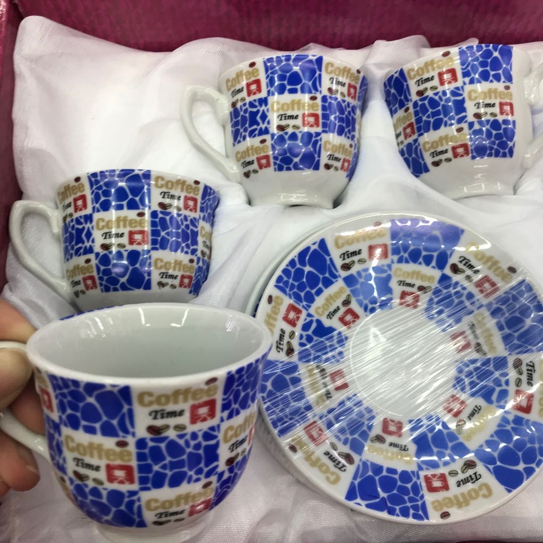 Coffee Being Poured Into Ceramic Cup on Saucer