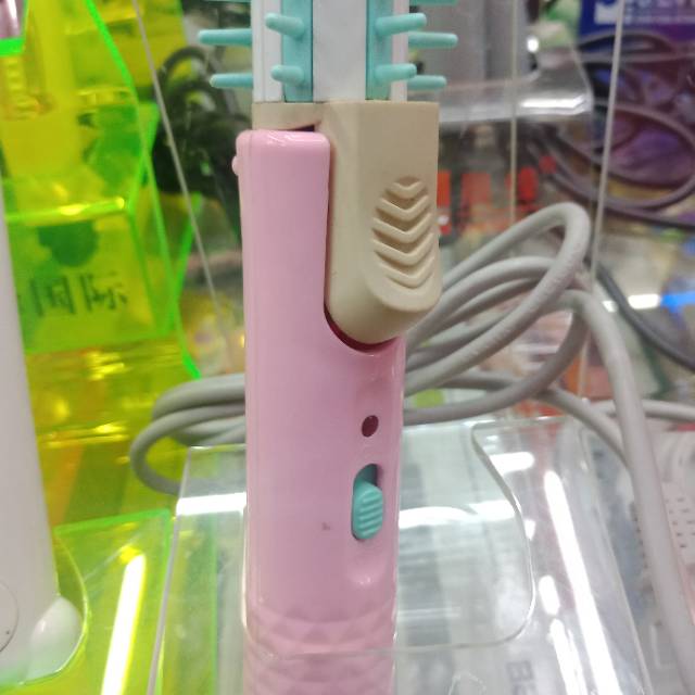 A wolf-toothed curling iron for girls details Picture