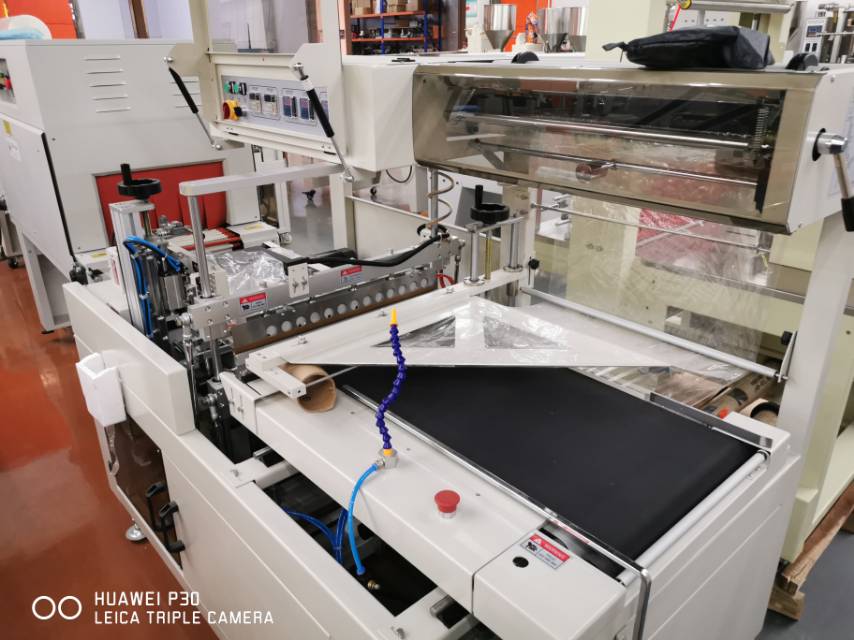 Fully automatic sealing, cutting and packaging machine