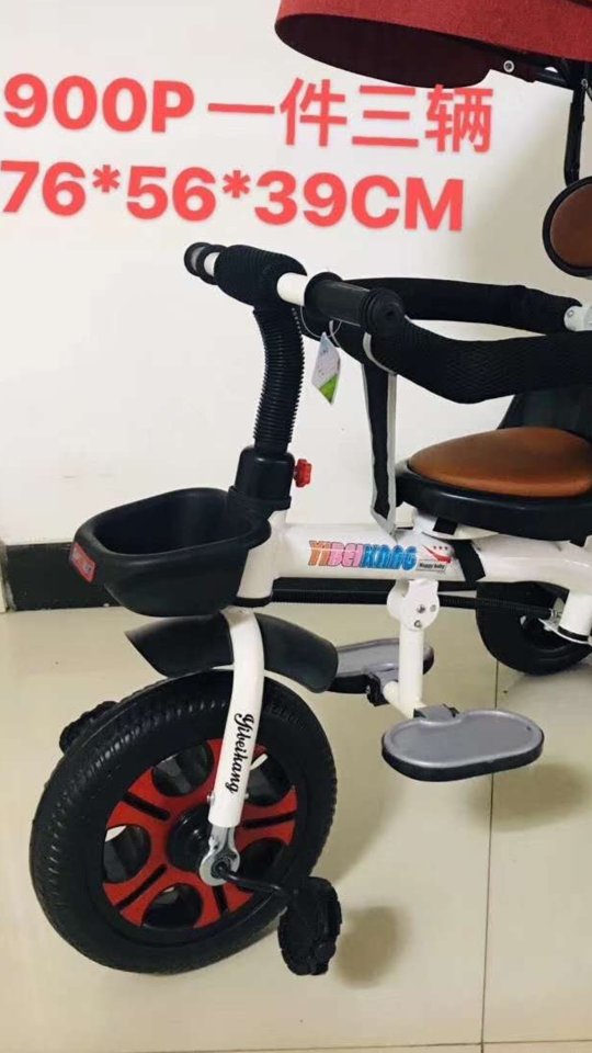 The 900 tricycle can be ridden, has pedals and can be pushed details Picture