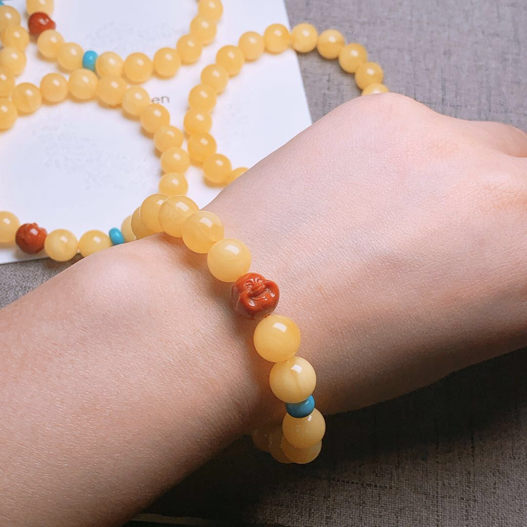 The beeswax suite-shaped bracelet has plump grains and rich wax texture. Xiangyu 0002 Specification image