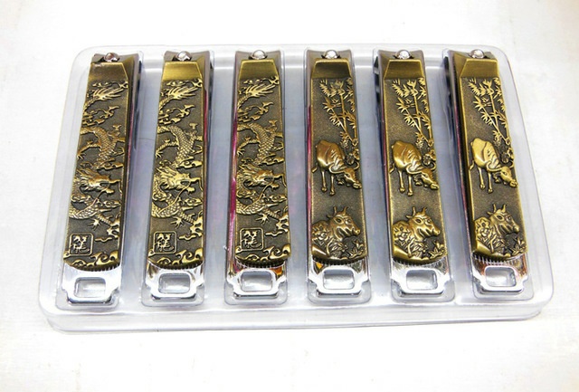 The mid-to-high-end nail clippers and nail clippers with antique bronze reliefs are available in a variety of supermarkets and stores. They are best-selling items with exclusive wholesale details Picture