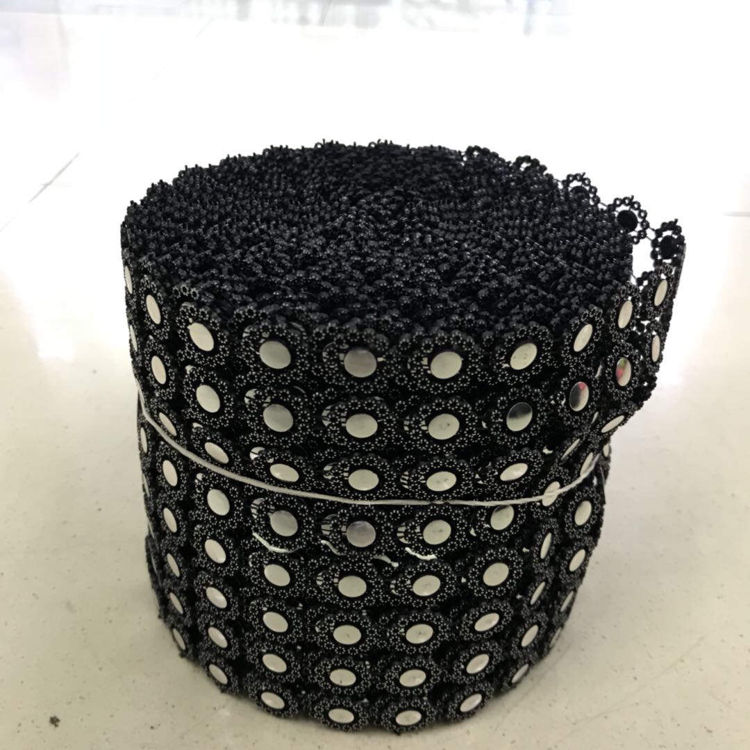 The clothing accessories feature a black base with patterned sequins and silver rhinestone trim Specification image