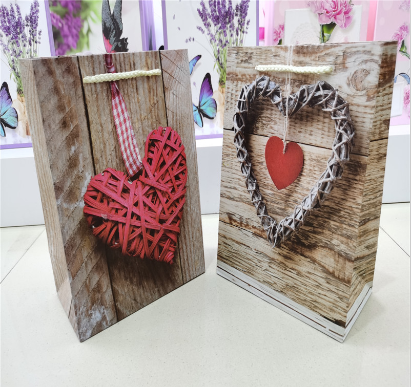 Factory direct sales of exquisite wedding gift bags, wedding candy bags, souvenirs, Valentine's Day handbags, and paper bags in stock details Picture