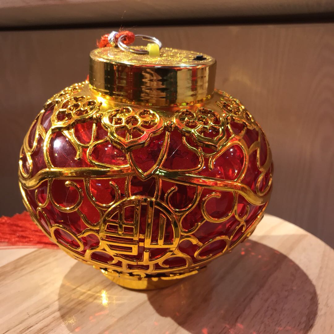 The golden lantern bodies with printed "Fu" characters are magnificent and add to the festive atmosphere