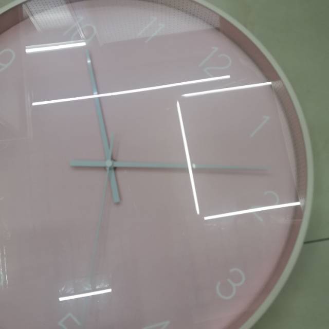 Modern and simple pink home clock, living room wall clock, creative bedroom, Nordic and American style clock, wall watch, silent and personalized decoration Specification image