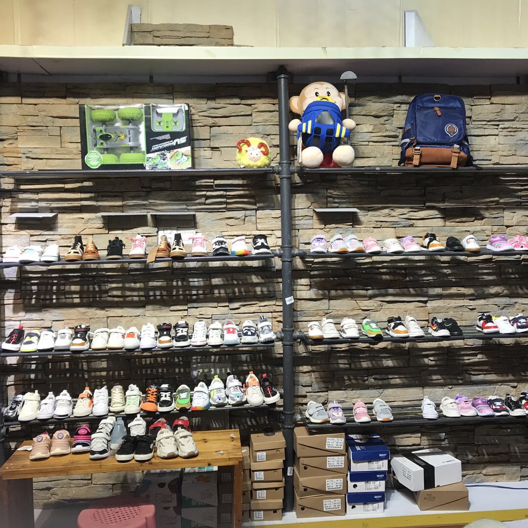 Famous stores on both sides describe pic - 3