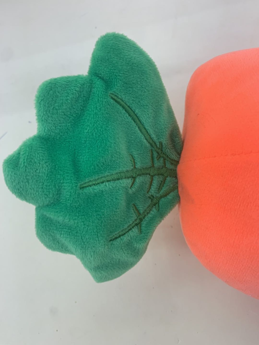 A plush toy with smiling faces and carrots bouncing around on all sides is a home decoration for children and girls Specification image