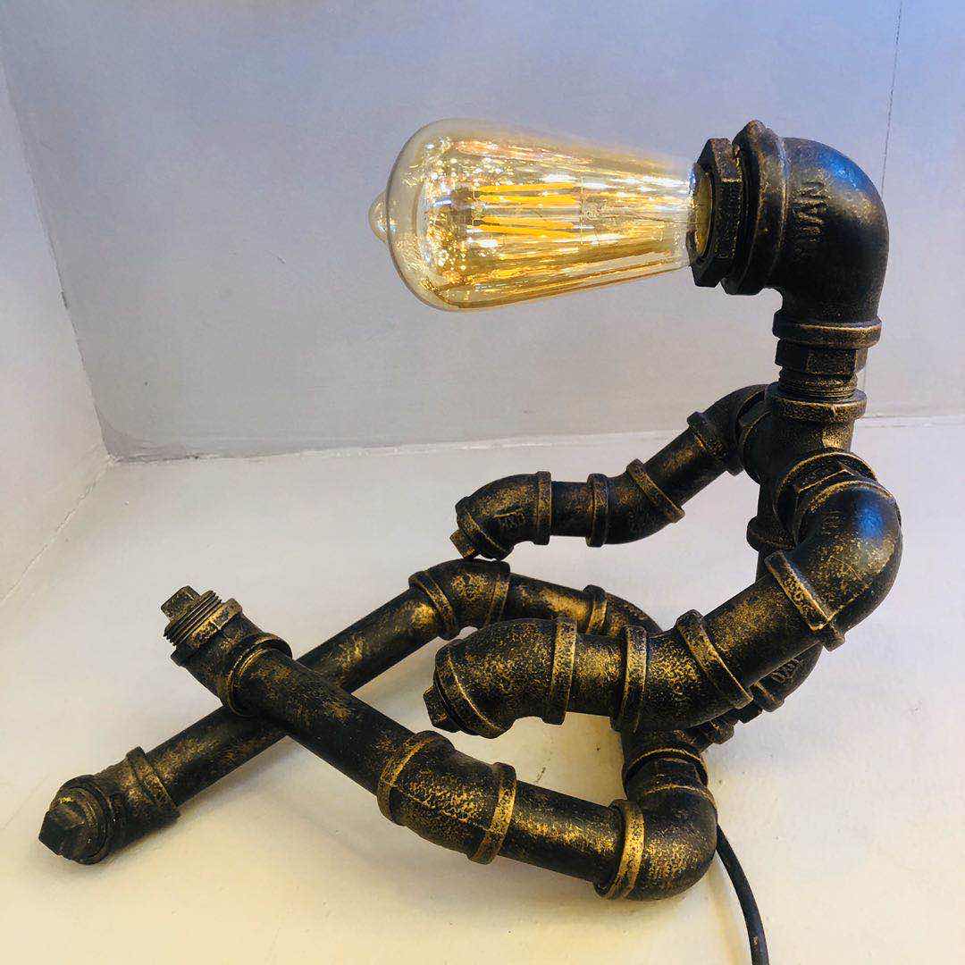 Industrial-style table lamp, personalized and creative decoration, coffee shop and bar table lamp, led retro and creative robot water pipe table lamp details Picture
