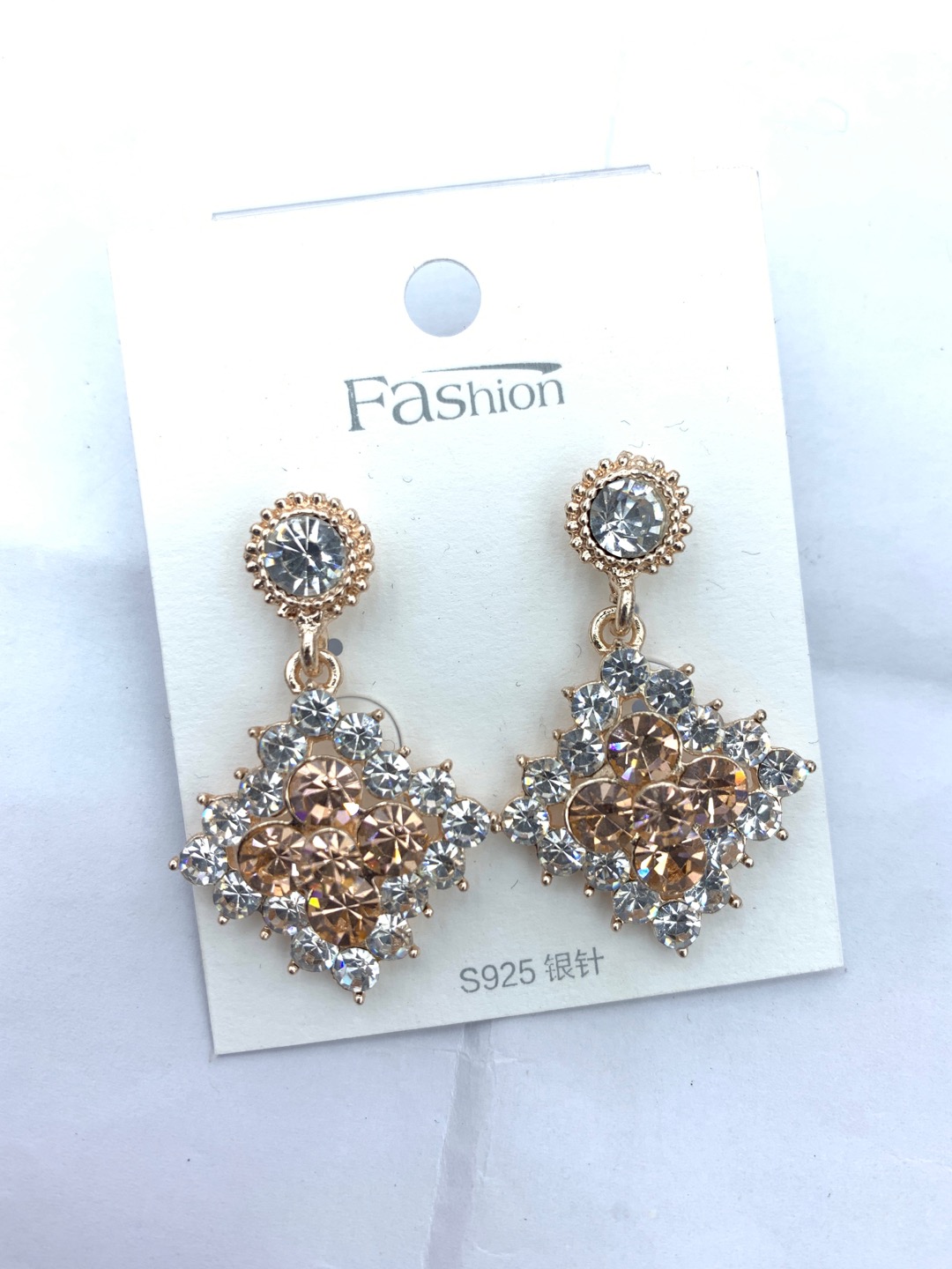 Stylish and diamond-encrusted women's earrings thumbnail