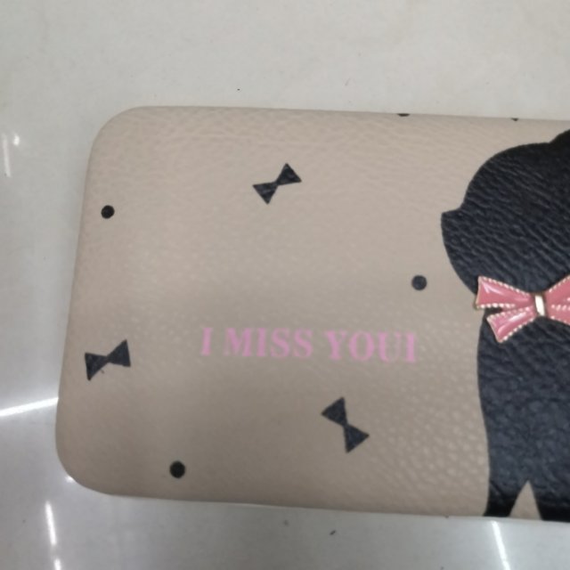 A cat-patterned wallet bag for girls Specification image