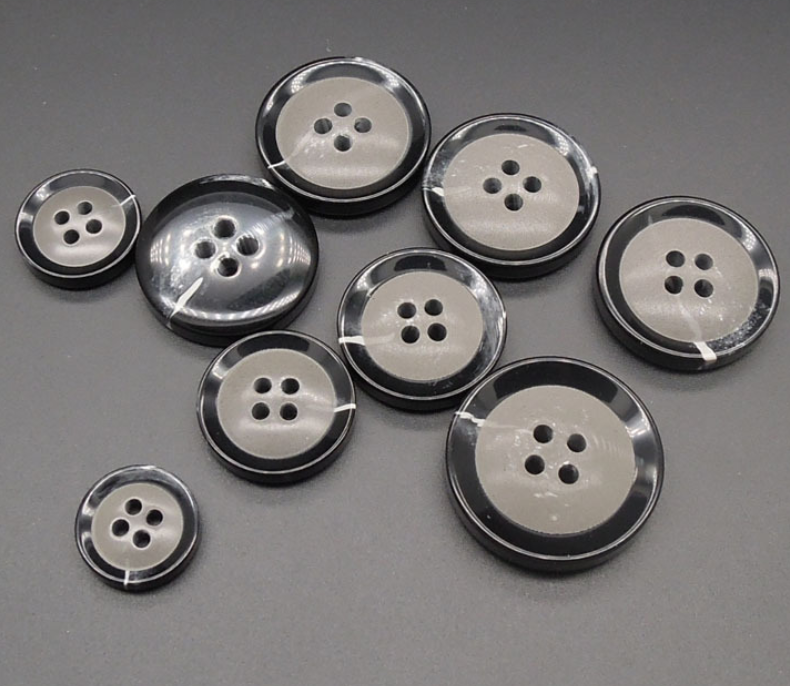Home direct selling resin buttons environmental protection black and white four eyes wide edge thin edge uniform buttons two eyes transparent shirt buttons thumbnail
