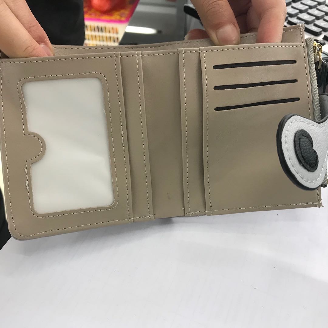 Ladies' wallet cartoon Korean version short ladies' wallet folding small wallet details Picture