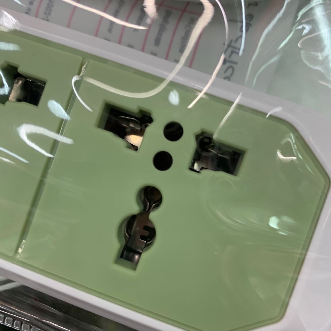Green Four-Hole Strip Socket Safe Against Leakage Specification drawing