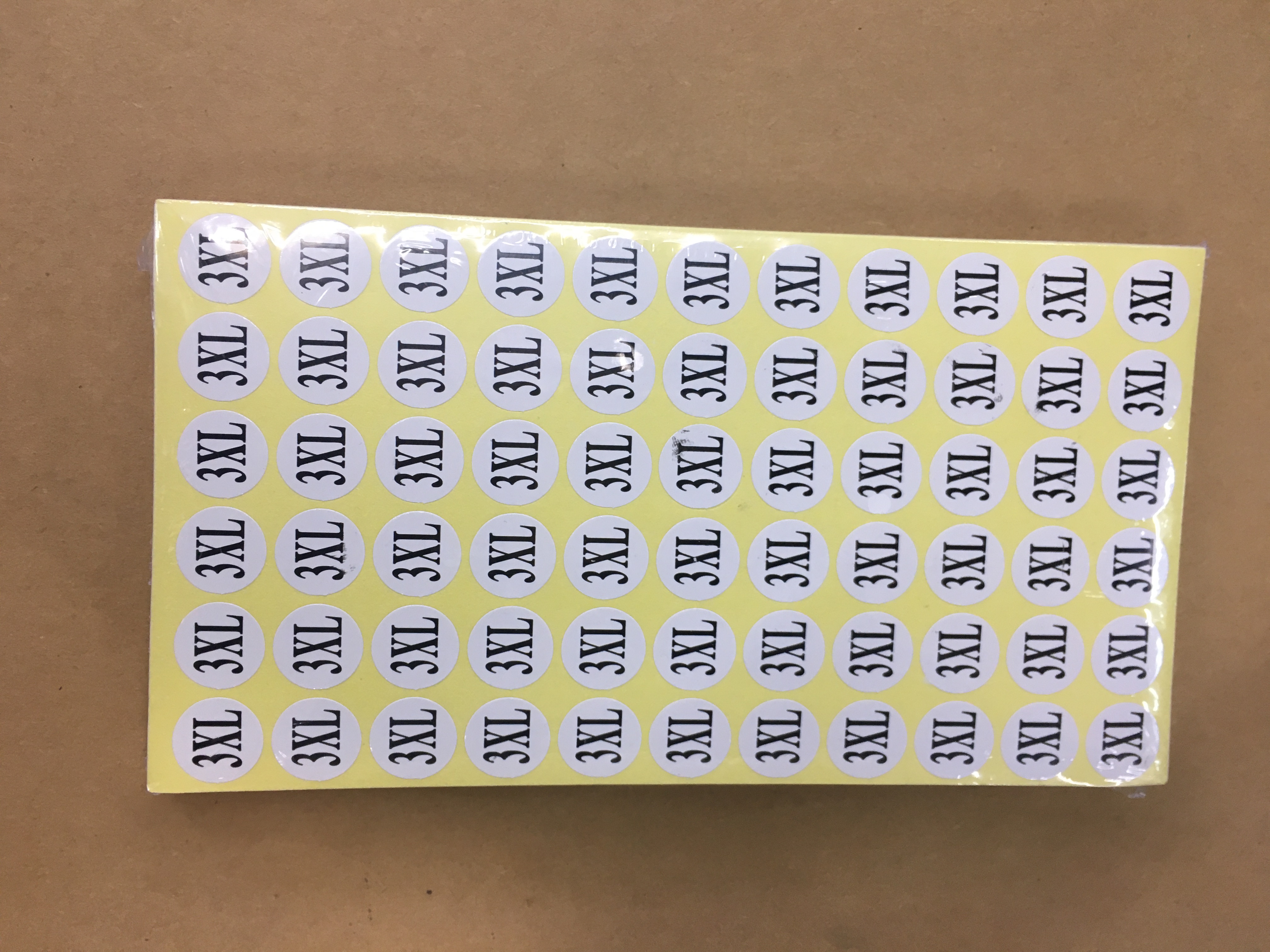 Letter and number stickers on clothing
