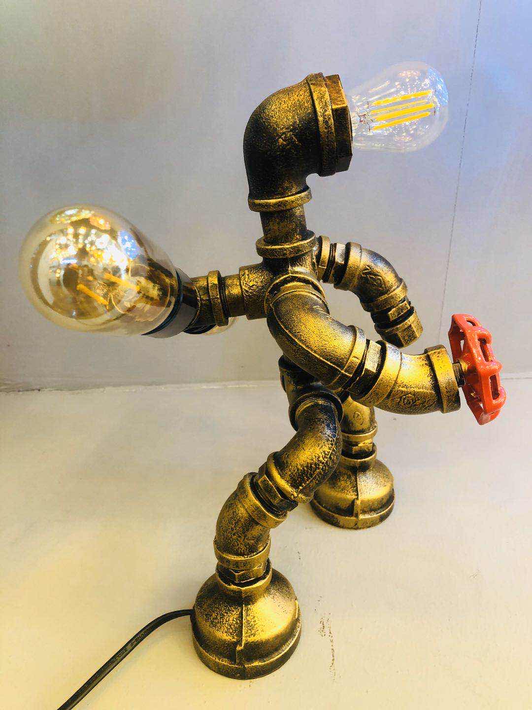 Industrial-style table lamp, personalized and creative decoration, coffee shop and bar table lamp, led retro and creative robot water pipe table lamp details Picture