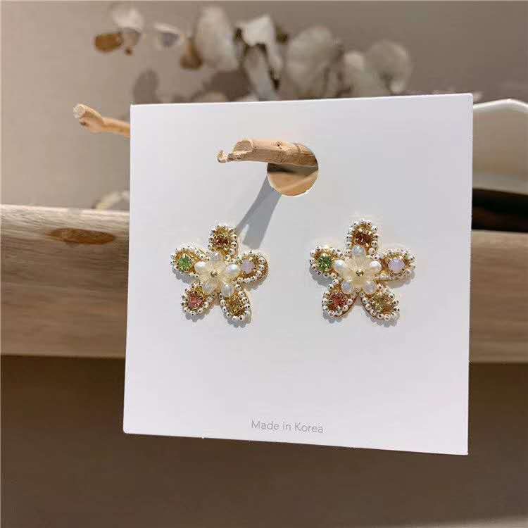 Korean fashionable golden small plum blossom diamond-encrusted alloy pearl gemstone feminine earrings Specification image