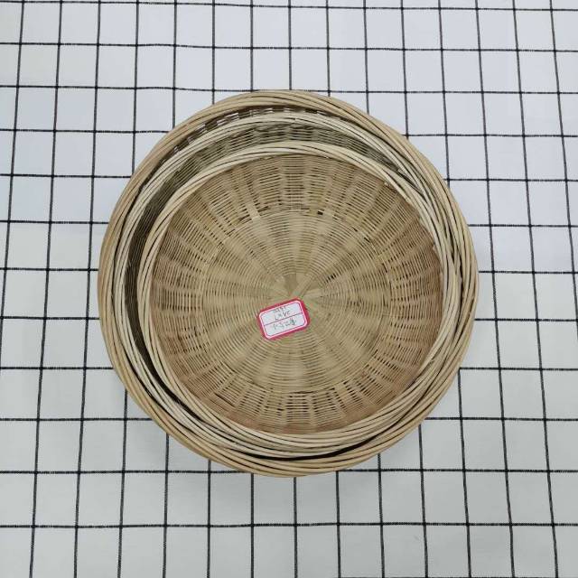 Bamboo basket organizing garden tools and outdoor supplies