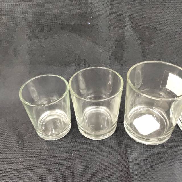 A transparent and cost-effective small cup for filling candles with a glass candlestick details Picture