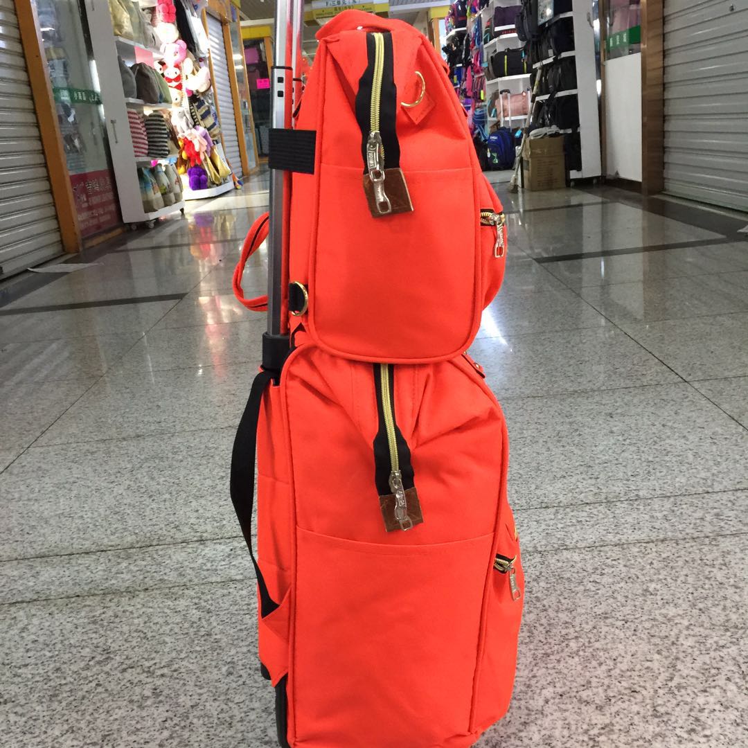 Extra-large capacity Oxford Cloth trolley bun mother bag, swivel wheel double shoulder trolley bag, solid color Korean version student trolley bag details Picture
