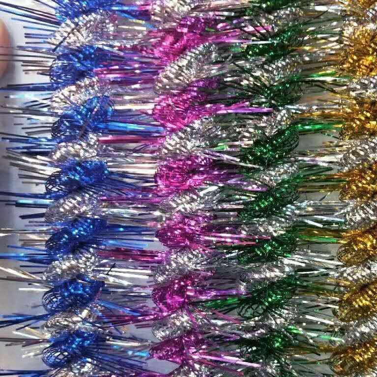The festival party is decorated with Christmas ornaments, wedding ribbons, streamers, and rubia cordifolia double dragons details Picture