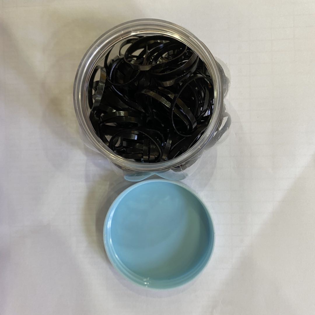 A small box of practical black, colorful elastic plastic rubber bands details Picture