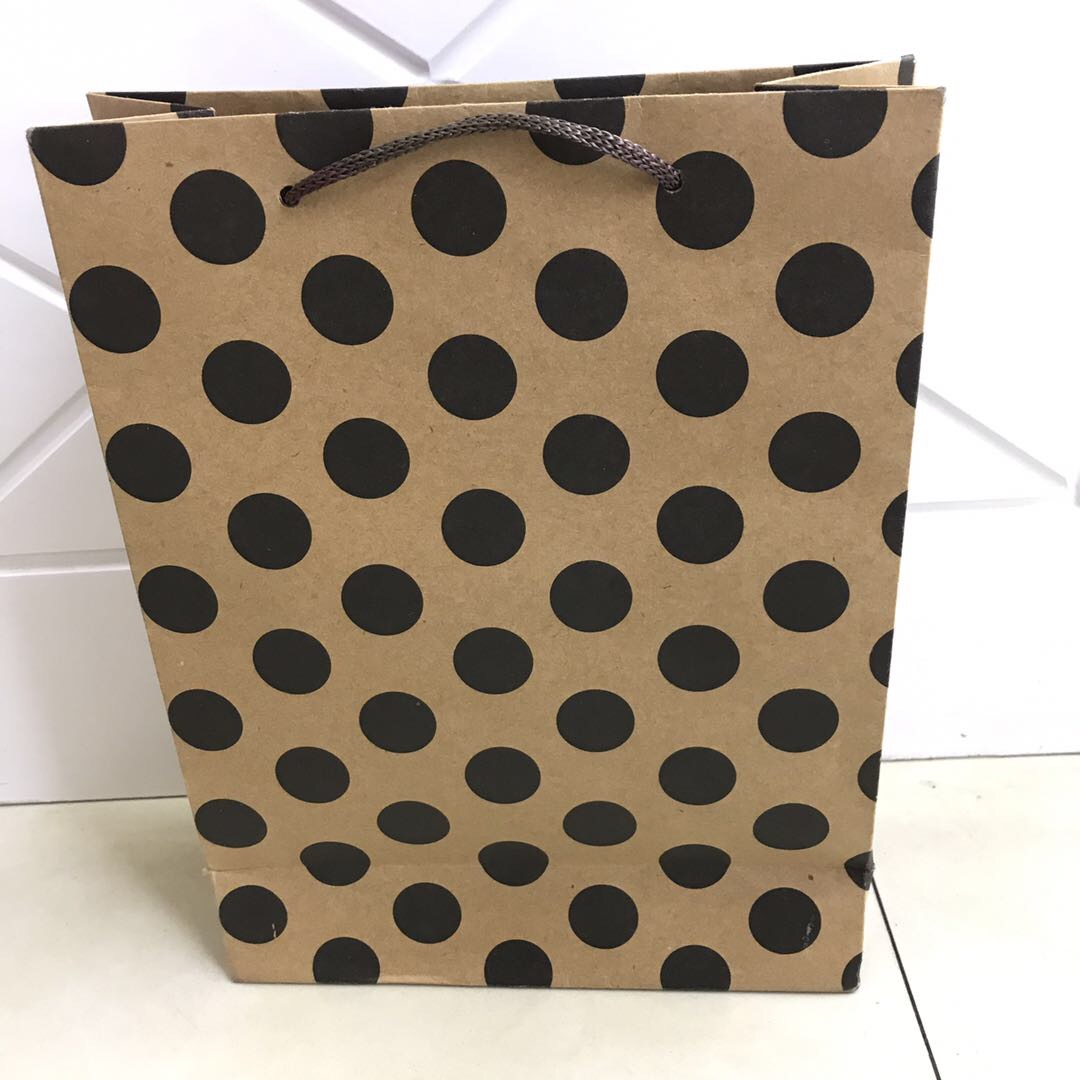 Spotted kraft paper bag
