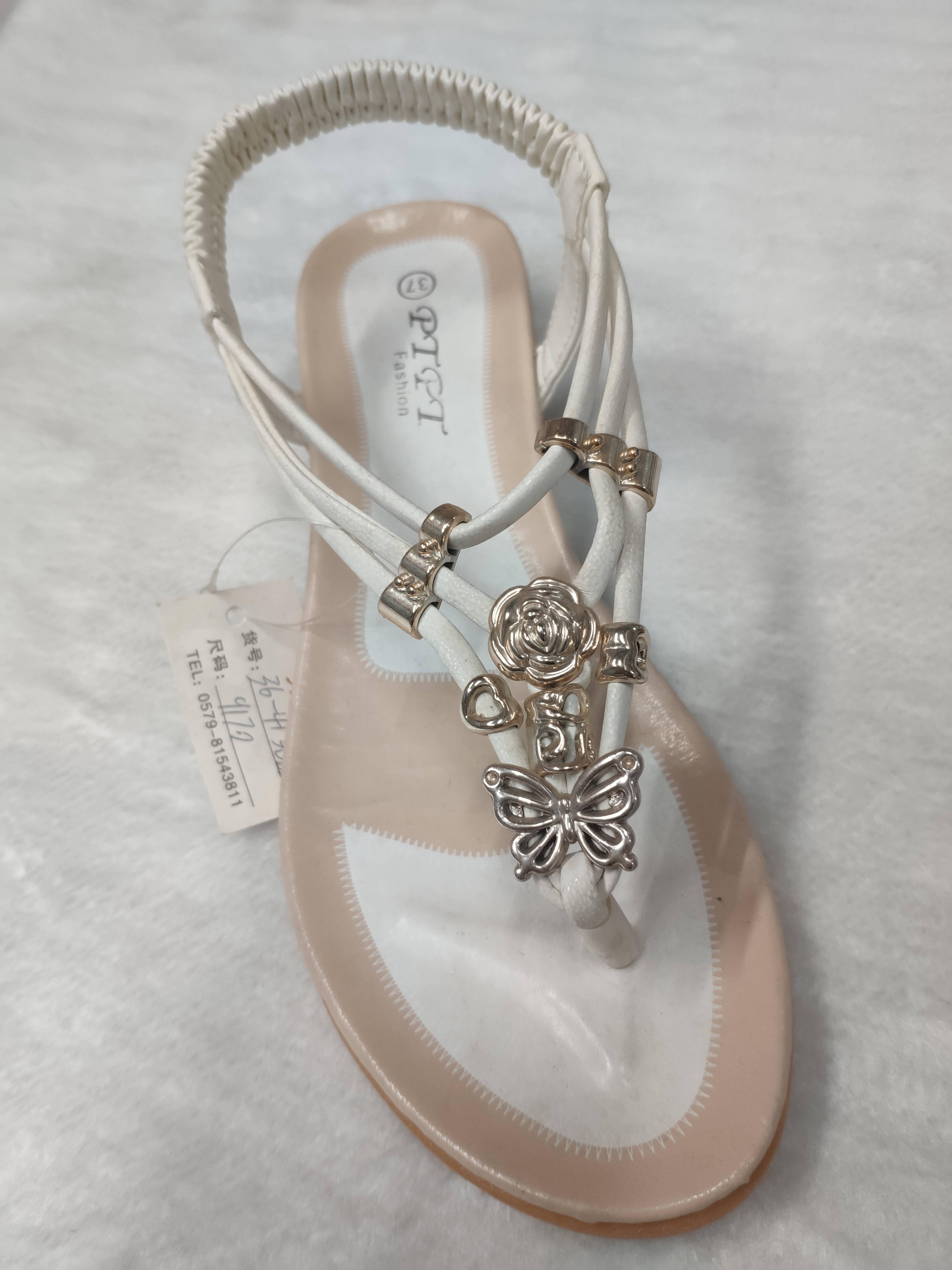 Foreign Trade Wholesale Summer Women's Herringbone Foot Butterfly Flower Metal Buckle Flat Elastic Sandals