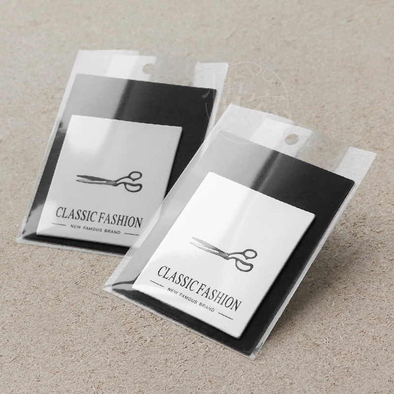 高档服装店商标牌设计黑卡烫银特种纸