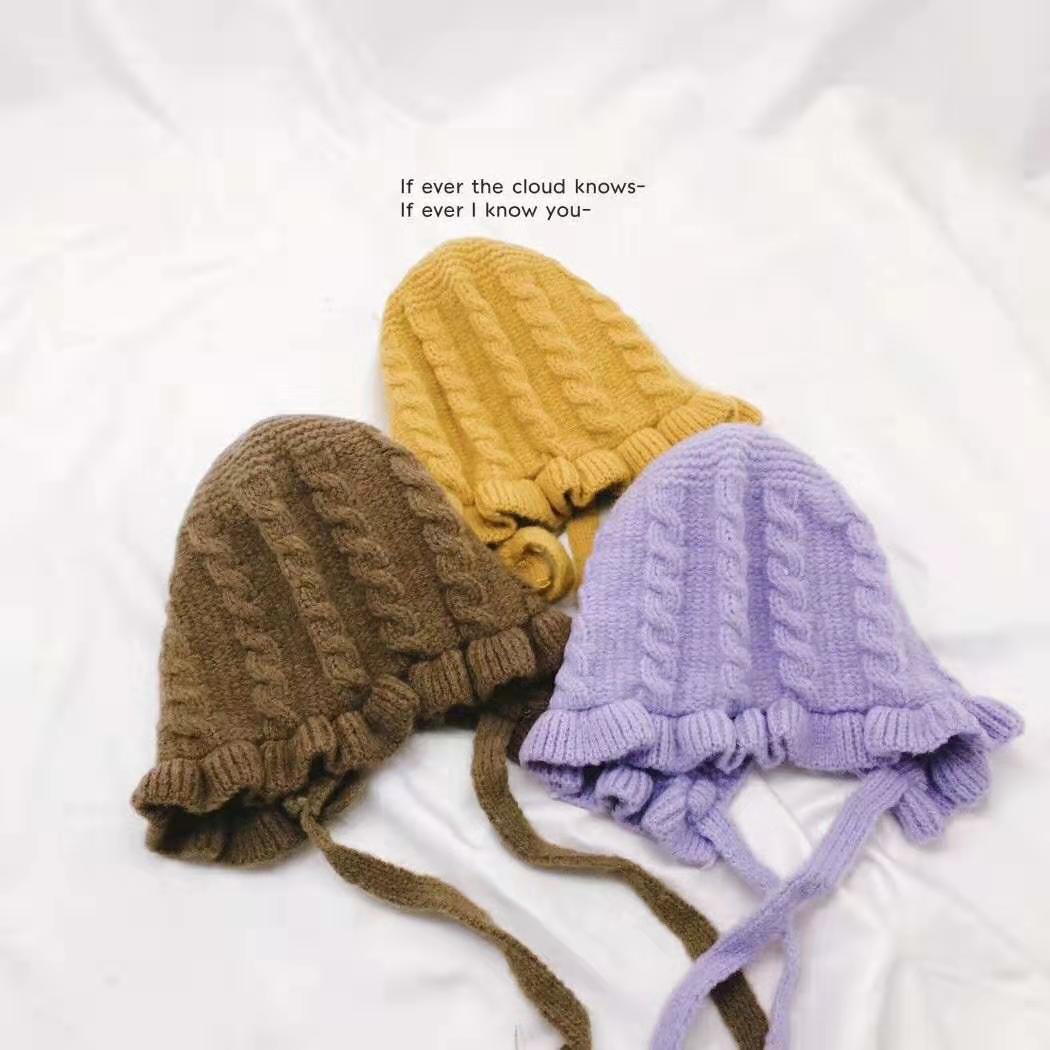 A fresh and simple lace tie solid-color children's knitted hat, warm and cute baby ear-protecting hat, woolen hat for autumn and winter details Picture