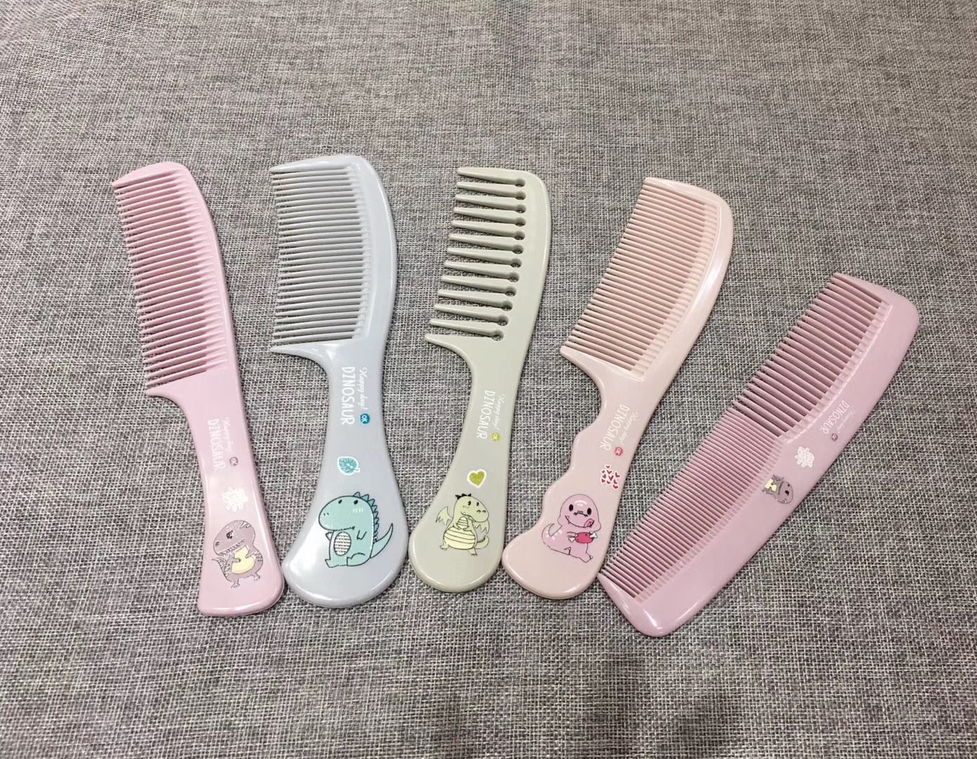 New dinosaur pattern plastic comb household portable plastic comb curly long hair cute big teeth wide teeth comb practical thumbnail