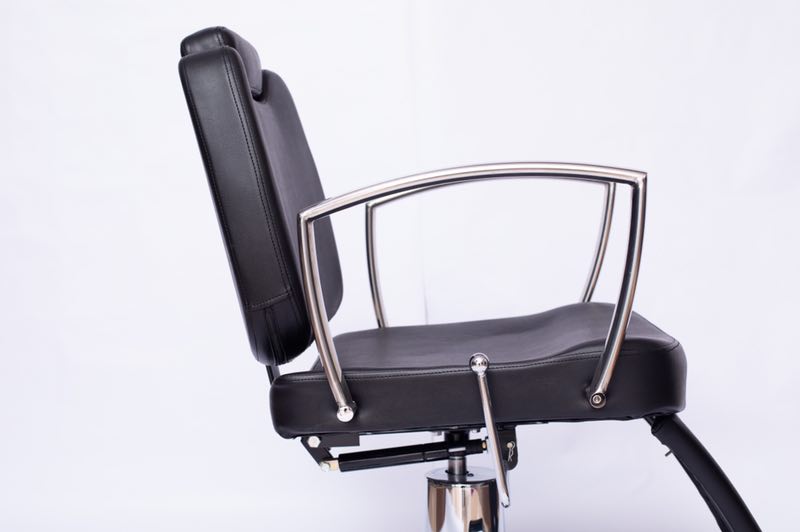 The black, simple, round and large base of the special retractable and height-adjustable hair salon chair for barber shops and hair salons Specification image