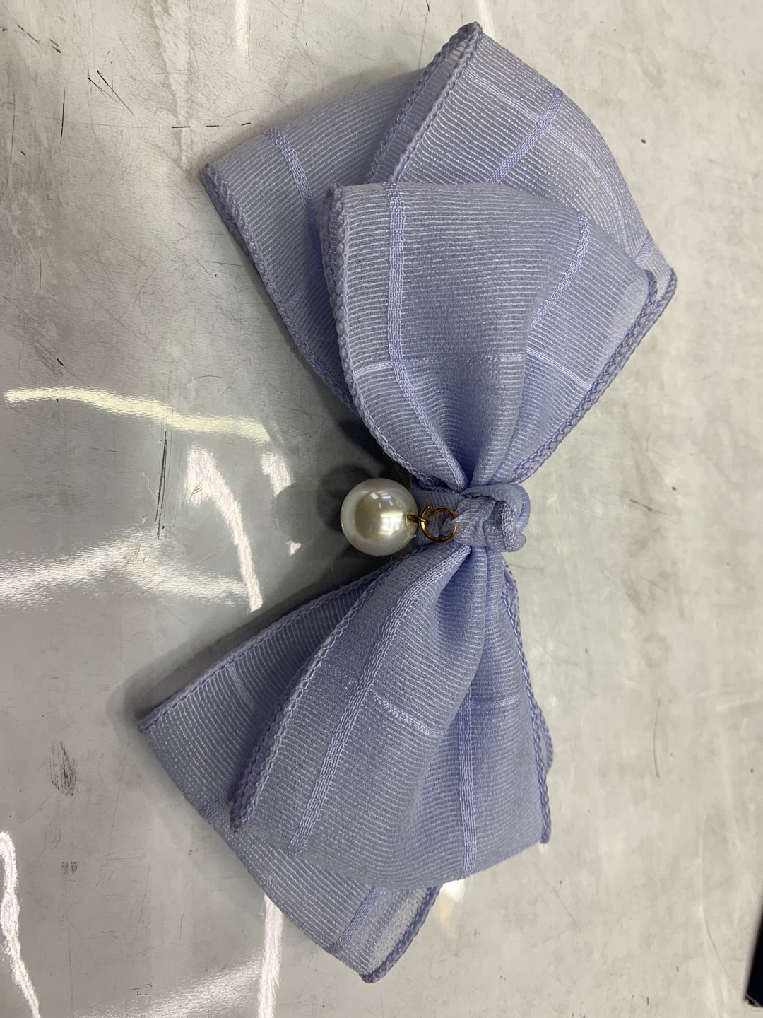 New silk satin, gauze and linen fabric with pearl bow hair clip