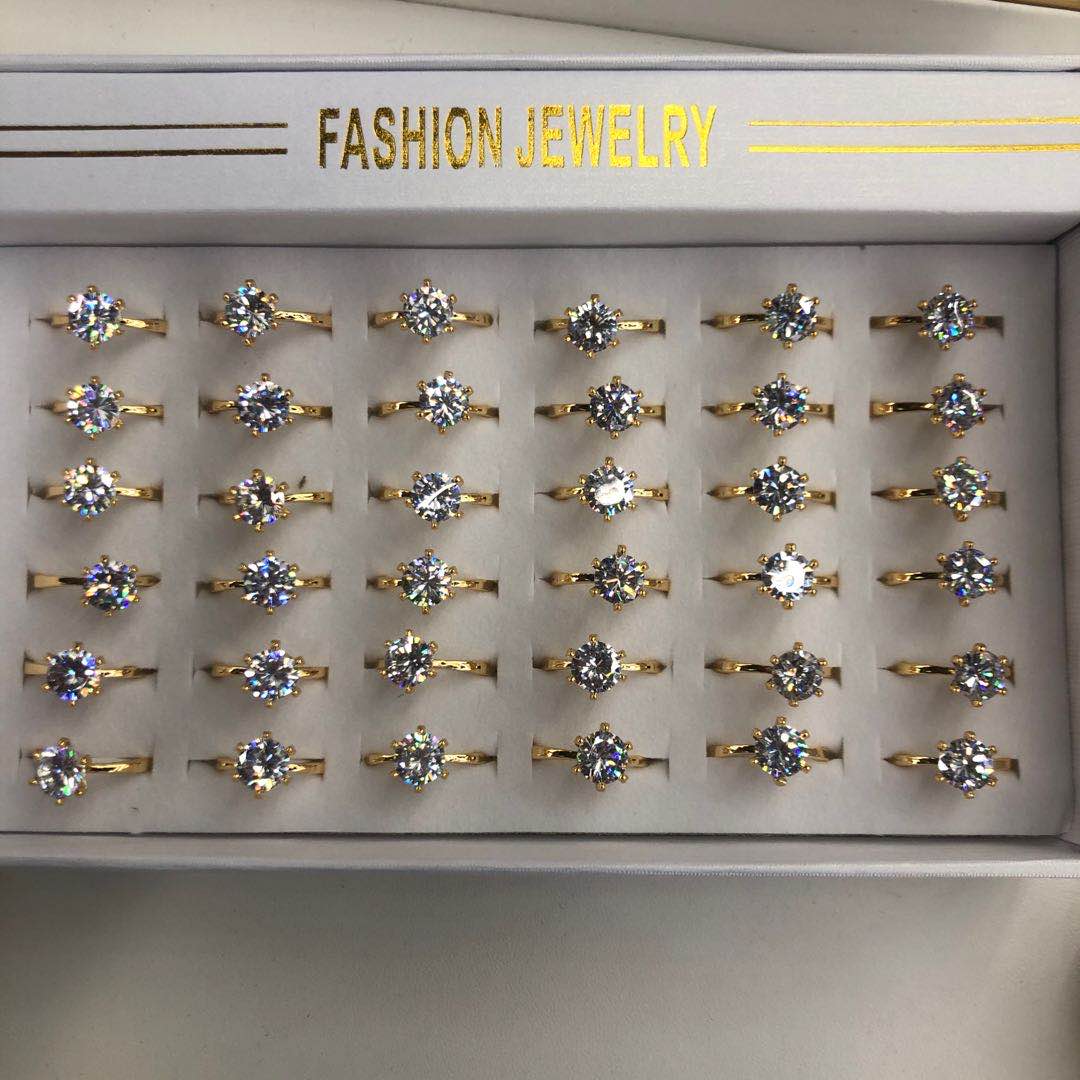 Korean style gold zircon ring on hand, showcasing minimalist elegance