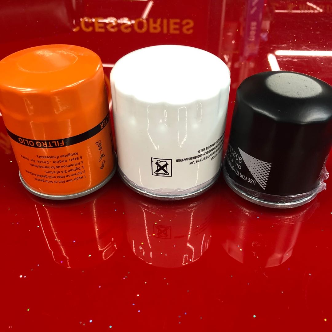 Multi-color and various models of car oil filters for sedans