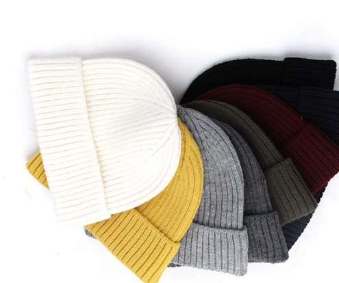 Custom Logo Embroidery Detail on Red Woolen Hat