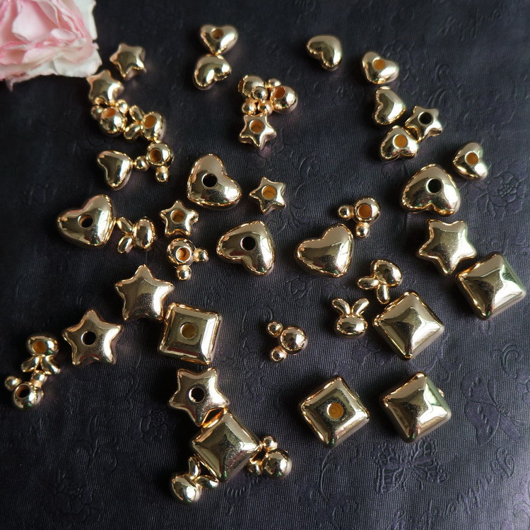 Factory direct sales of single-hole irregular-shaped hair band and hair rope accessories, as well as wholesale of heart-shaped electroplated bead hair accessory accessories