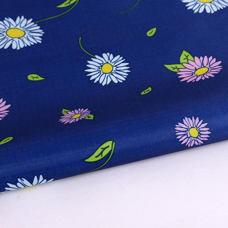 150D兰色菊花三分格印花PVC耐磨牛津布 户外用品箱包牛津布料细节图