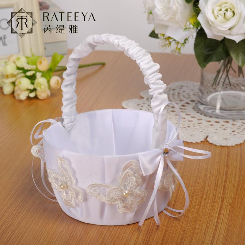 Direct supply from wedding product manufacturers: European-style wedding flower boys, flower baskets, creative hand-embroidered flower-scattering baskets, bows, and bride's wedding baskets