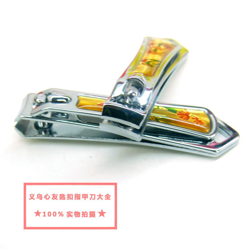 712 medium-sized gold rubber flat nail clippers, night market, street stall, two-yuan store, shopping mall, small supermarket, department store wholesale details Picture