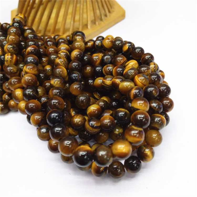 Guangshun Jewelry offers wholesale of natural yellow tiger's Eye stone loose beads and semi-finished tiger's eye stone products. DIY jewelry beads are sold directly by the manufacturer undefined