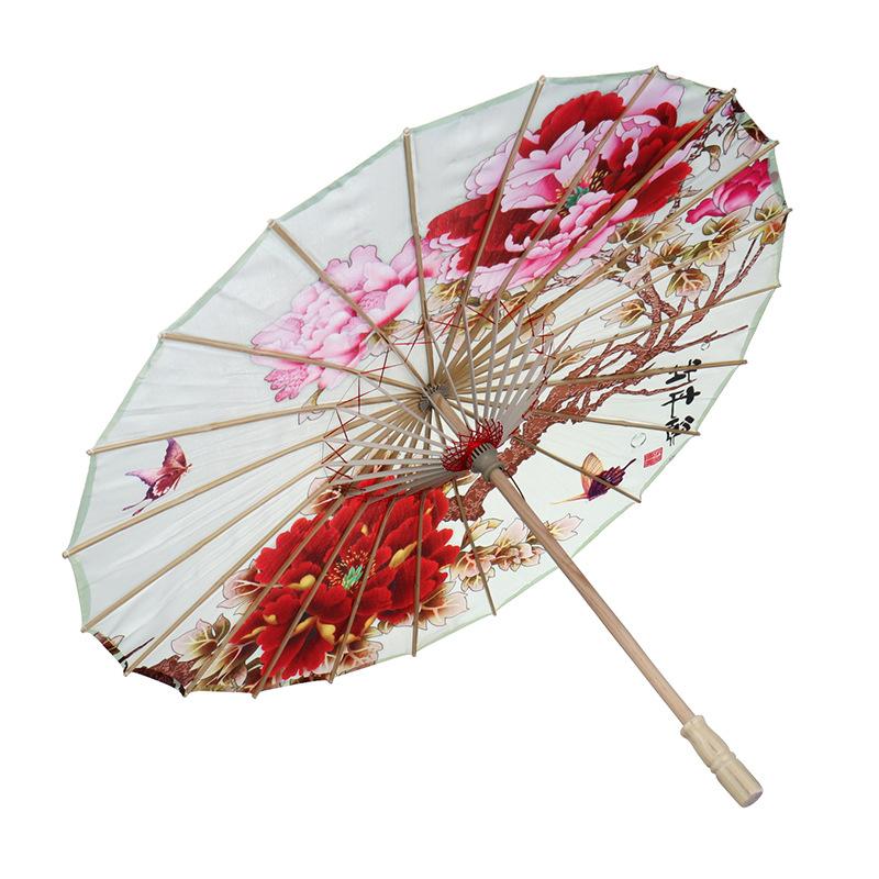 Wholesale of wedding product creative decorative umbrellas, handcrafted bamboo edge craft multi-color oil-paper umbrellas, scenic area event decorative umbrellas, dance prop umbrellas Item Picture