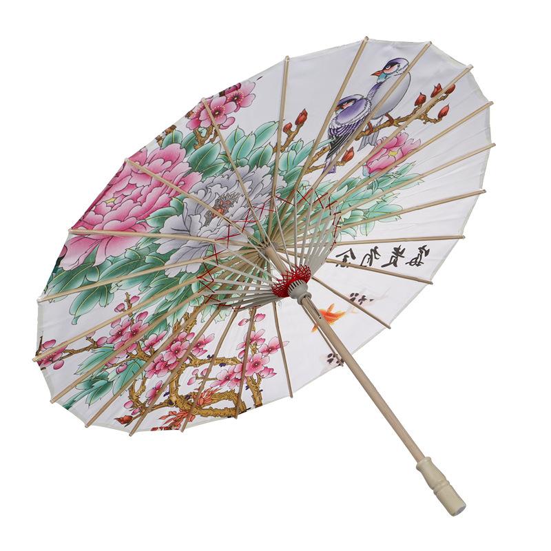 Wholesale of wedding product creative decorative umbrellas, handcrafted bamboo edge craft multi-color oil-paper umbrellas, scenic area event decorative umbrellas, dance prop umbrellas Application Scenario