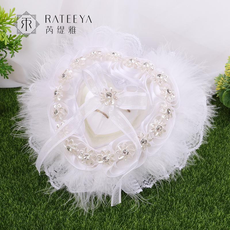 Wedding products, wedding products, wedding products, wedding products, wedding products, direct supply from wedding product manufacturers, new white wedding ring pillows, heart-shaped lace trim rings for brides and grooms, wedding supplies