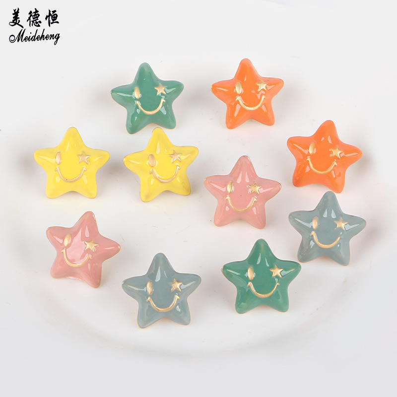 Factory direct sales of 20mm alloy material oil-dripping golden smiling five-pointed star diy loose bead hair accessory, 100 matching pieces of beads