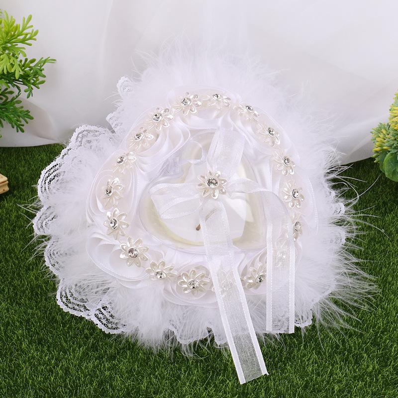 Wedding products, wedding products, wedding products, wedding products, wedding products, direct supply from wedding product manufacturers, new white wedding ring pillows, heart-shaped lace trim rings for brides and grooms, wedding supplies undefined