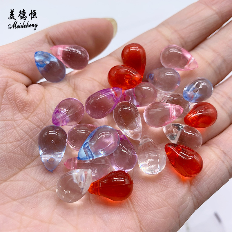 Two diy DIY hair accessories, hairpins and headwear beads with a hanging hole, featuring the same colorful transparent water drop beads as the popular ones