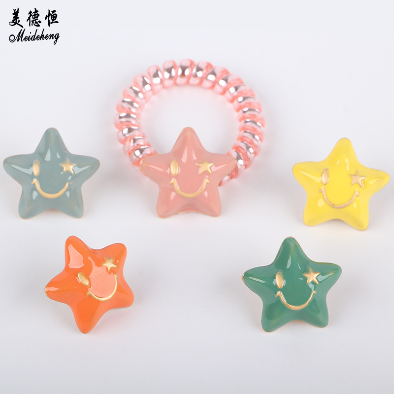Factory direct sales of 20mm alloy material oil-dripping golden smiling five-pointed star diy loose bead hair accessory, 100 matching pieces of beads Specification image