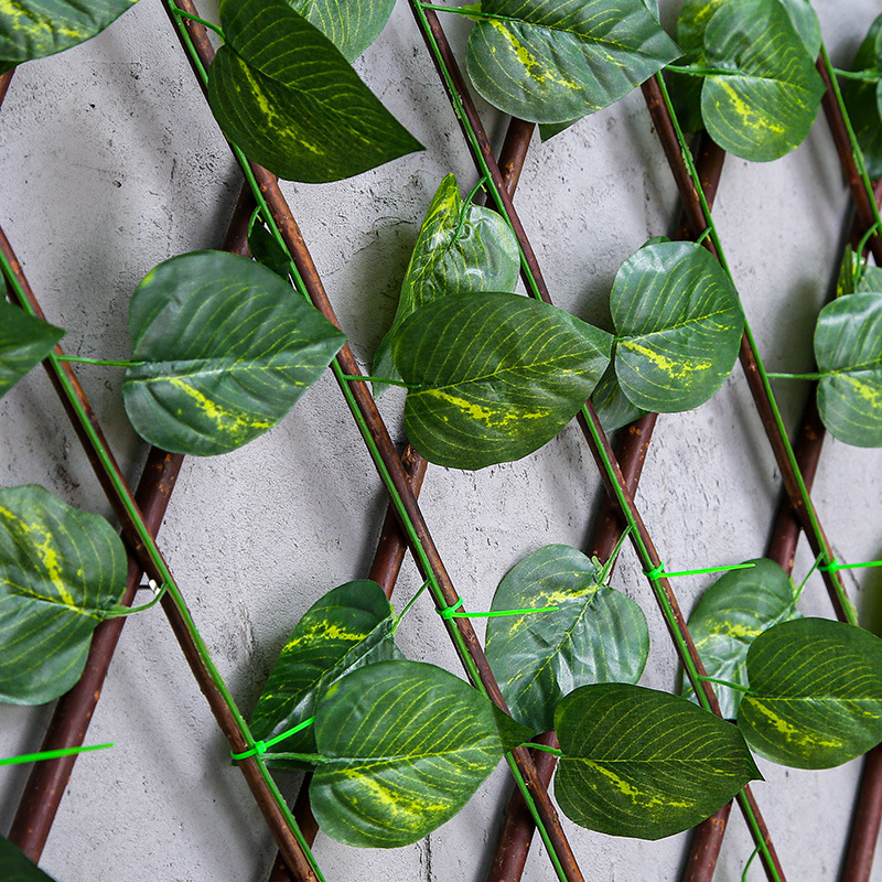 Wholesale of artificial fence leaves, outdoor wooden fences, plant courtyard enclosures, decorative telescopic wooden fences and railings Application Scenario